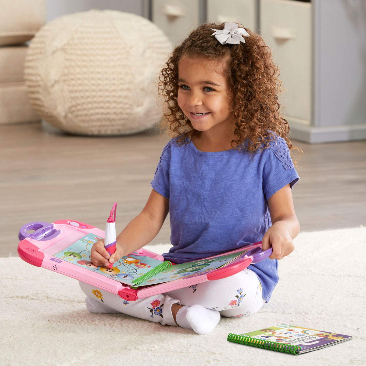 LeapFrog LeapStart pink preloaded-books provide ready-to-use content.