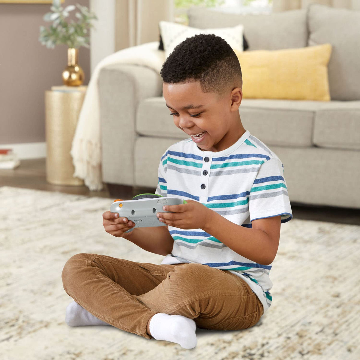 LeapFrog Leapster Ultra with Nom-Nom berry game teaches even-number counting.
