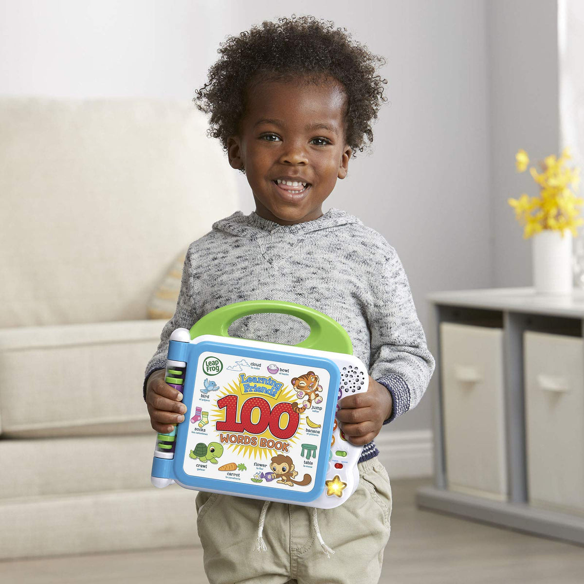 Light-up star button plays two learning songs