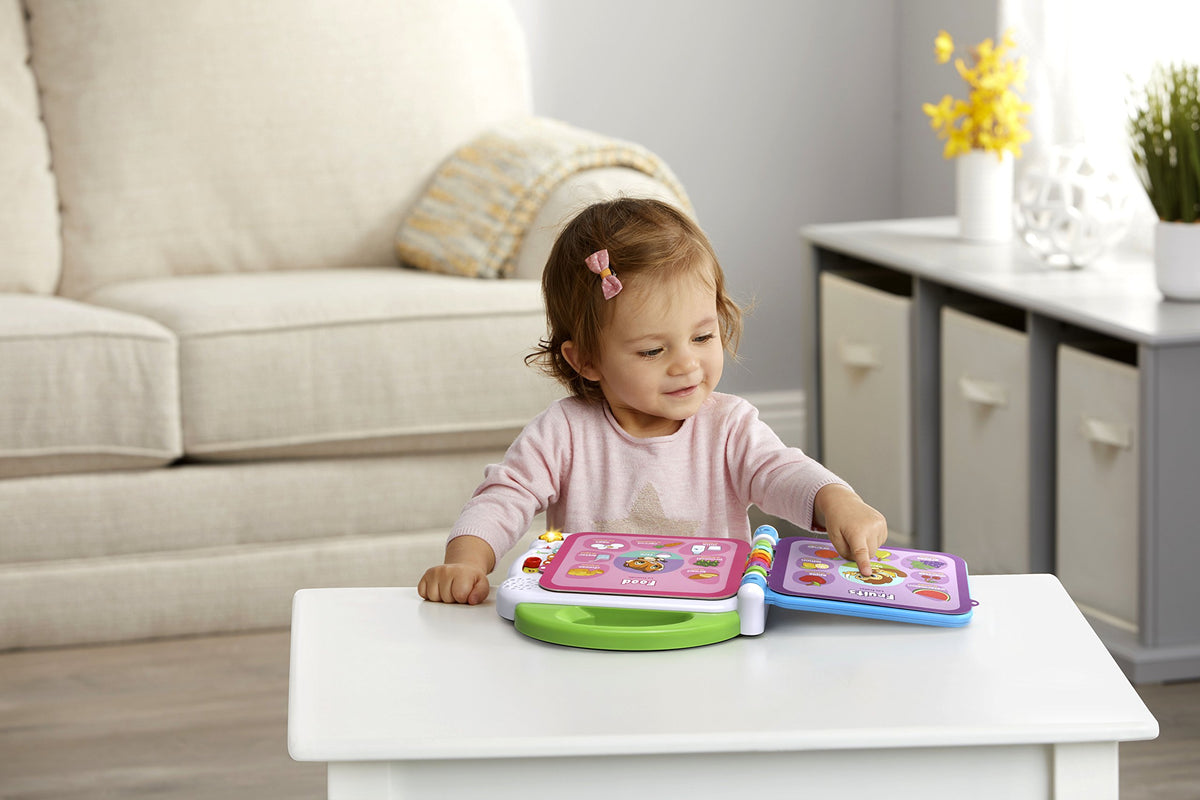 Pages with words invite touch and pronunciation practice.