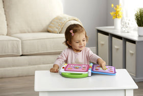 Pages with words invite touch and pronunciation practice.