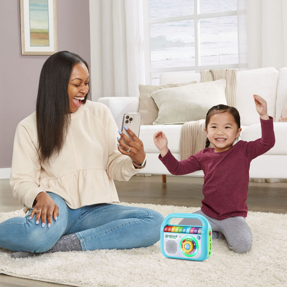 LeapFrog Let's Record Music Player teal streaming soundscapes from a device