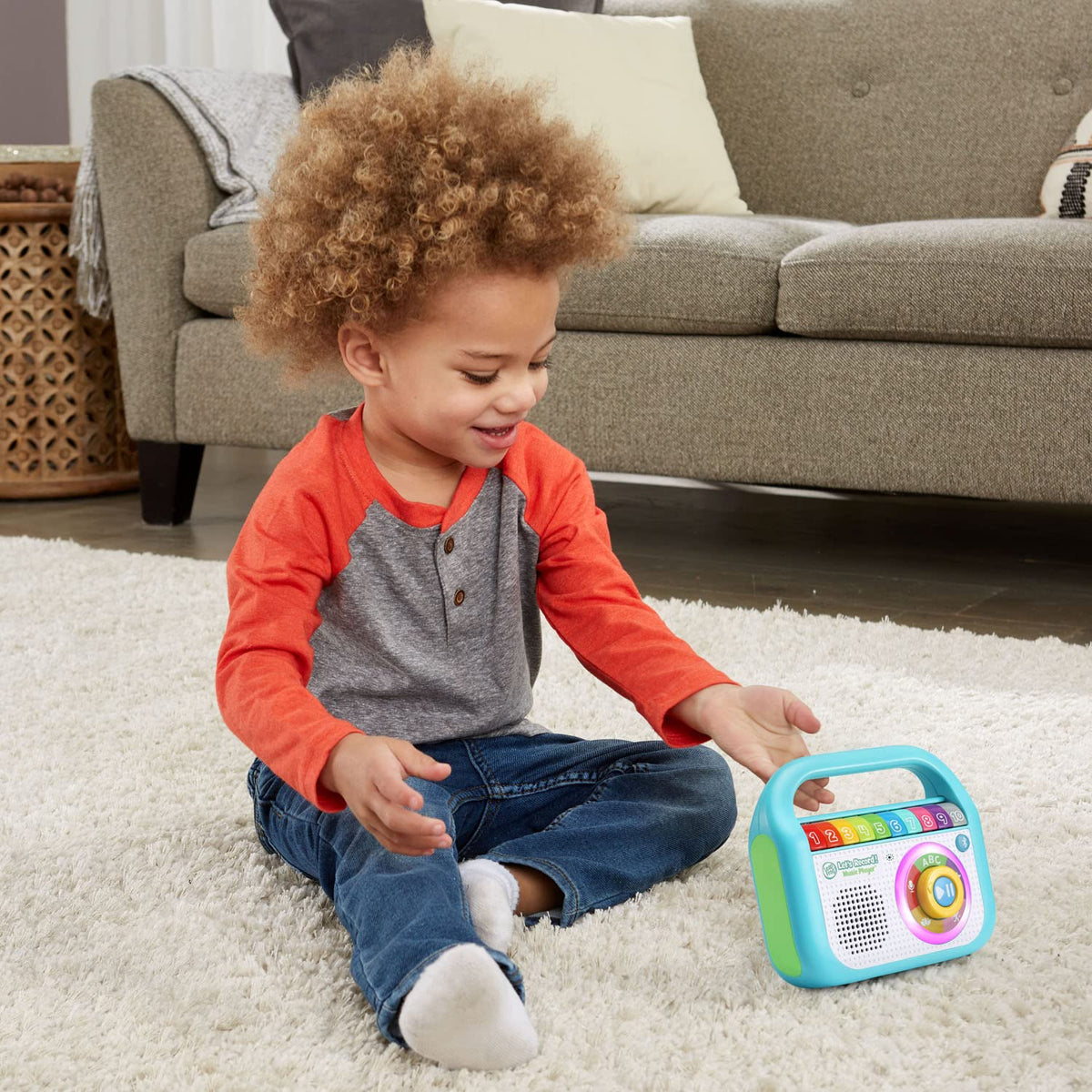 LeapFrog Let's Record Music Player teal packaging and quick-start guide