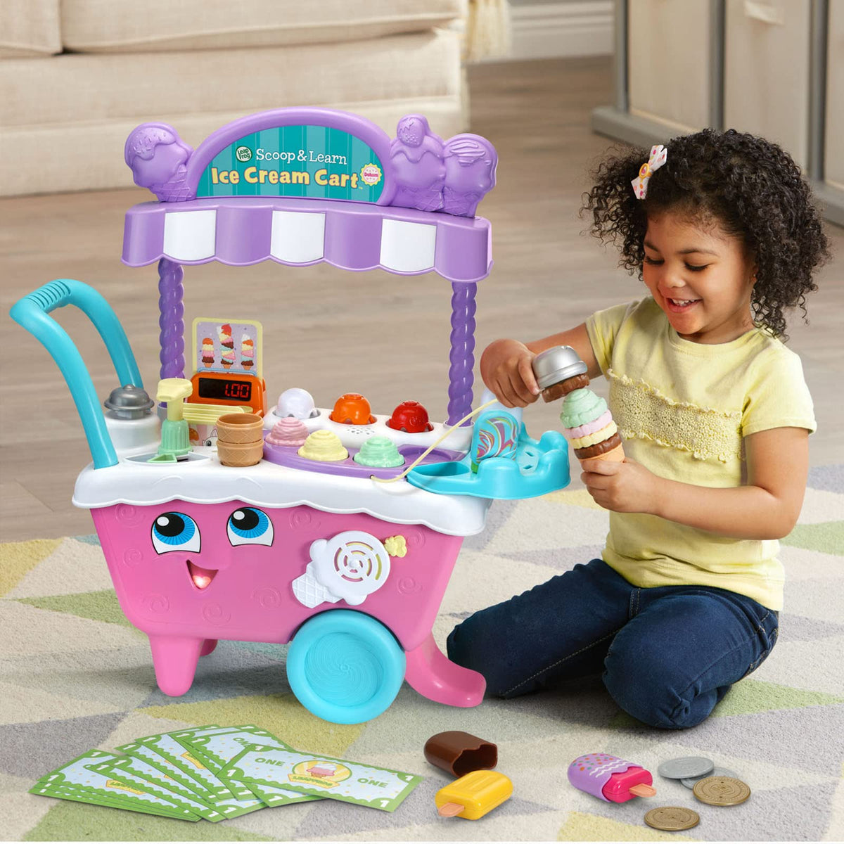 LeapFrog Scoop and Learn Ice Cream Cart Deluxe pink pretend money supports early math skills.
