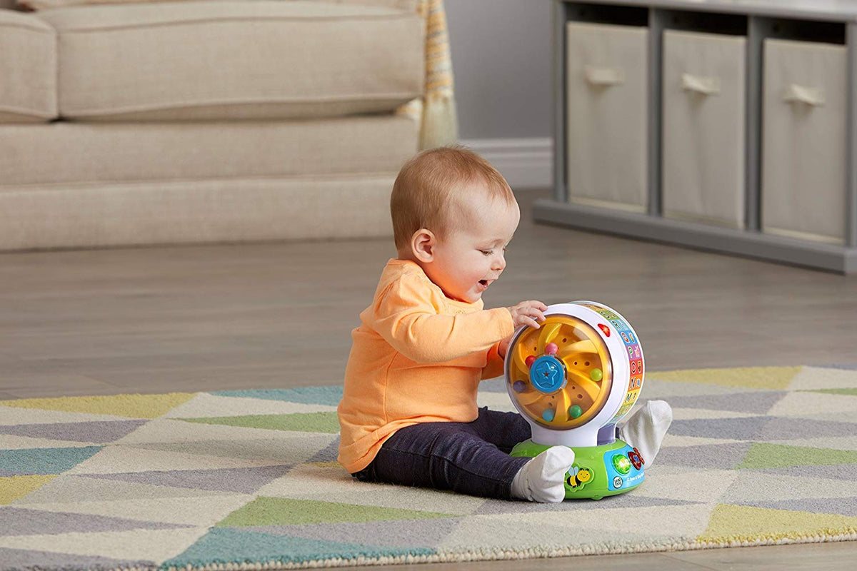 LeapFrog Spin and Sing Alphabet Zoo projects LED colors through shapes as the wheel spins.
