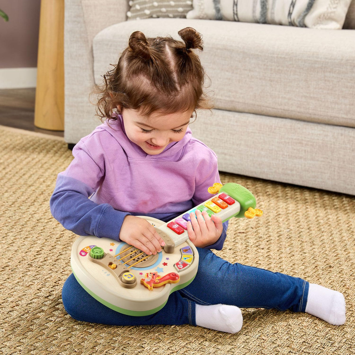 LeapFrog Strum and Count wooden guitar strings invite strumming and creative tunes.