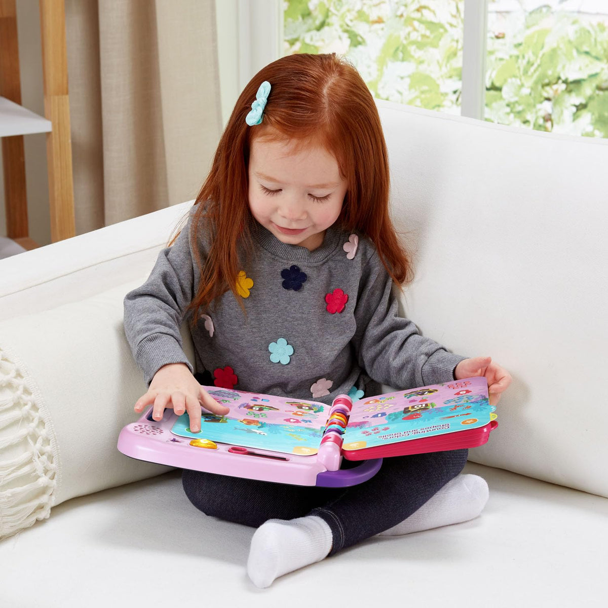 LeapFrog Violet and Friends hint-button—to help kids when stuck.