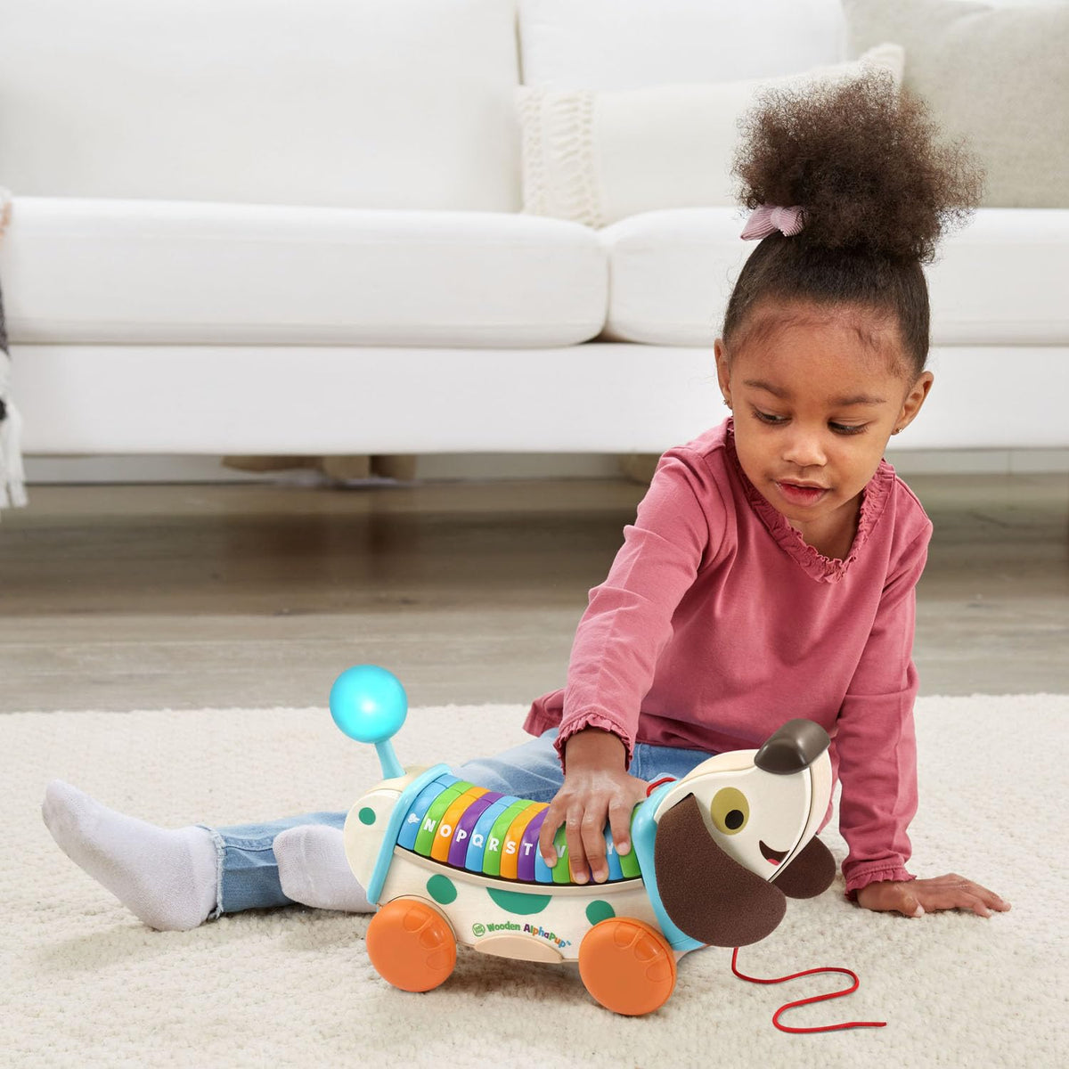 LeapFrog AlphaPup includes demo batteries; replace with two AA for regular use.