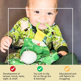Baby learns letters and colors with The Learning Lovey tag toy