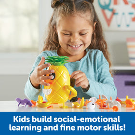 Double-sided emotions on the Learning Resources Pineapple Deluxe set for mood comparison.