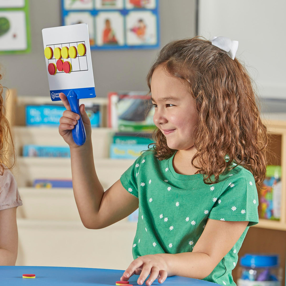 Learning Resources 100 foam magnetic counters in red and yellow aid hands-on learning.