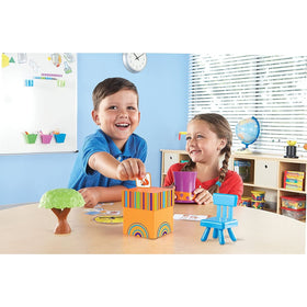 Learning Resources Fox in the Box orange box promotes position word practice.