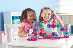 Learning Resources Gears! Gears! Gears! Deluxe Pink interlock closeup highlights motion and cause‑effect exploration.
