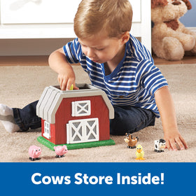 Learning Resources Hide-N-Go Moo pig figures for momma-baby matching play.