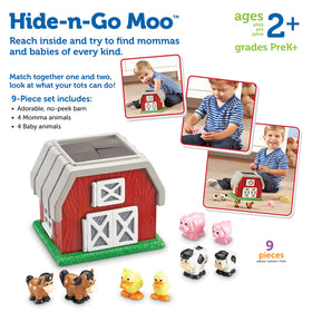 Learning Resources Hide-N-Go Moo toddler reaching into barn for exploration.