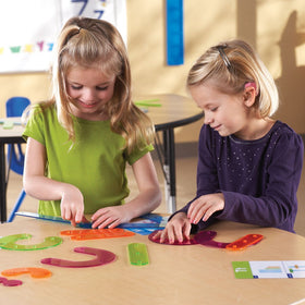 Color-coded parts from Learning Resources support tactile letter mastery