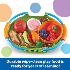 Learning Resources New Sprouts healthy dinner basket promotes family mealtime role-play.