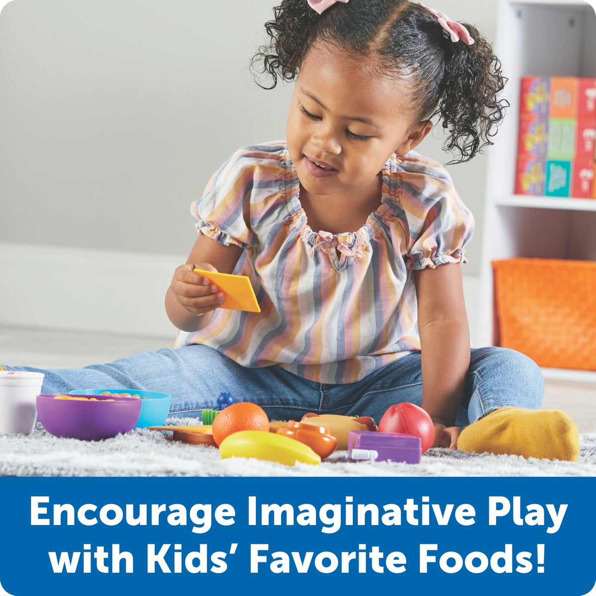 Learning Resources New Sprouts Munch It! cereal with spoons for pretend breakfast and fine motor practice.