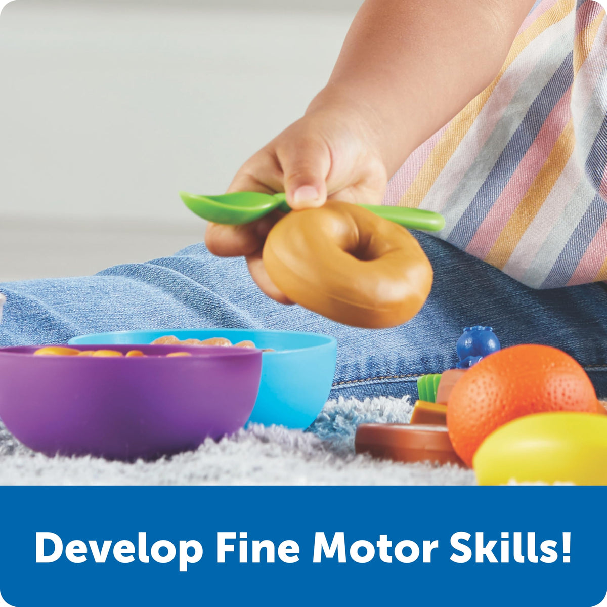 Learning Resources New Sprouts Munch It! fruits assortment for healthy eating concepts during pretend meals.