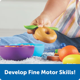 Learning Resources New Sprouts Munch It! fruits assortment for healthy eating concepts during pretend meals.