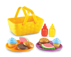 Learning Resources New Sprouts Picnic Set with divided plates for organized pretend meals.