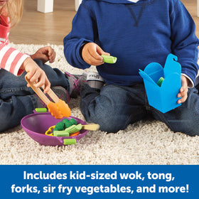 Learning Resources New Sprouts stir fry spatula supports coordinated stirring during play.