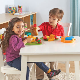 Play scene featuring the Waffle Time breakfast set for kitchen role play