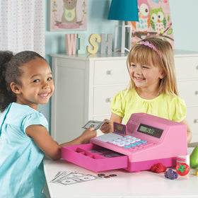 Learning Resources pink cash drawer open during play, mimicking real store transactions and sounds