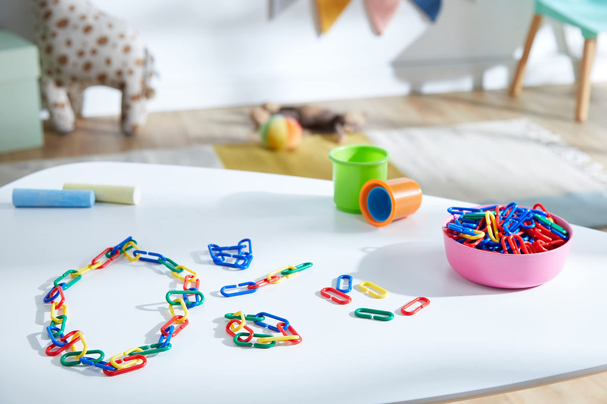 Storage bucket for Learning Resources Rainbow Links keeps pieces organized