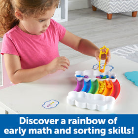 Learning Resources Rainbow Sorting Set fine motor tongs aiding hand strength and coordination.