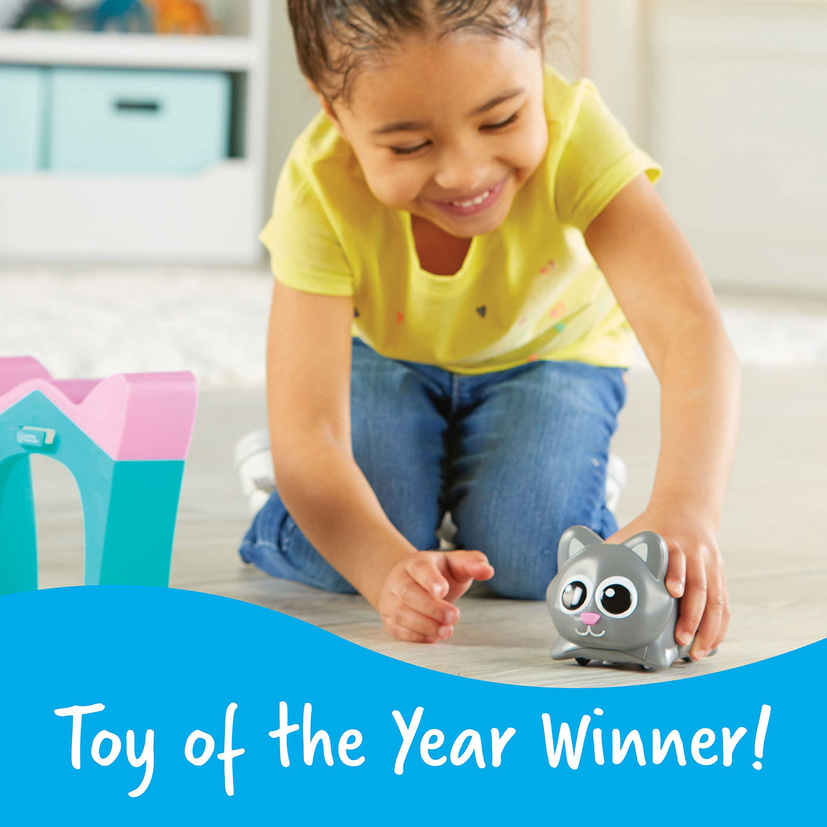 Learning Resources Scamper robot cat in action guiding kids through hands-on coding.