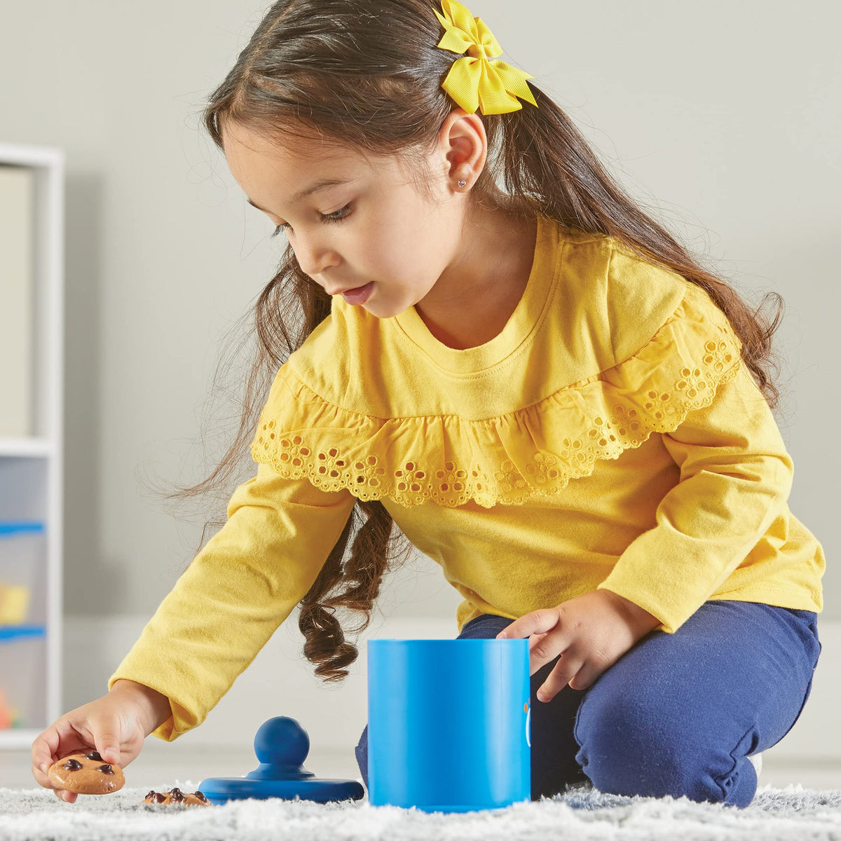 Learning Resources Smart Counting Cookies hand grasping strengthens fine motor skills.