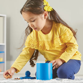 Learning Resources Smart Counting Cookies hand grasping strengthens fine motor skills.