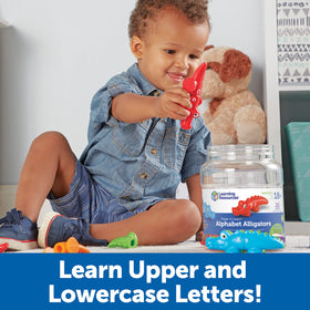 Closeup of Snap-n-Learn Alphabet Alligators pieces snapping together to boost fine motor skills