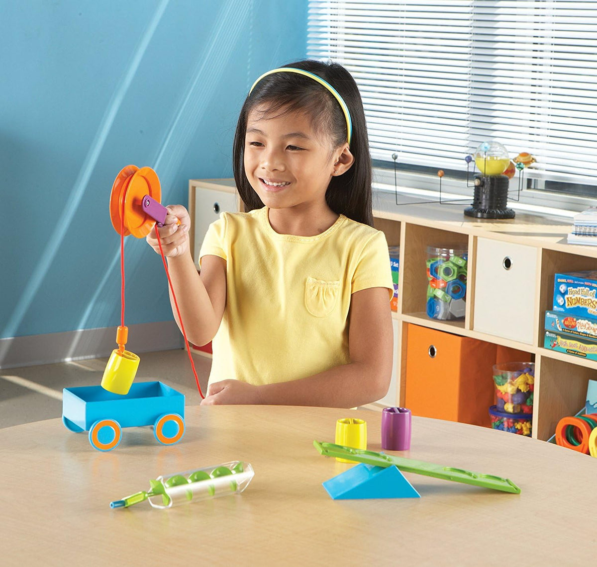 Learning Resources pulley setup demonstrating lifting and coordinated movement.