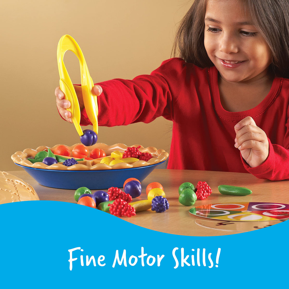 Learning Resources Super Sorting Pie two jumbo tweezers develop pincer grasp.