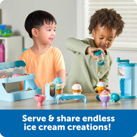 Learning Resources Swirly Scoops cones with toppings showcases precise cone building and pretend sharing.