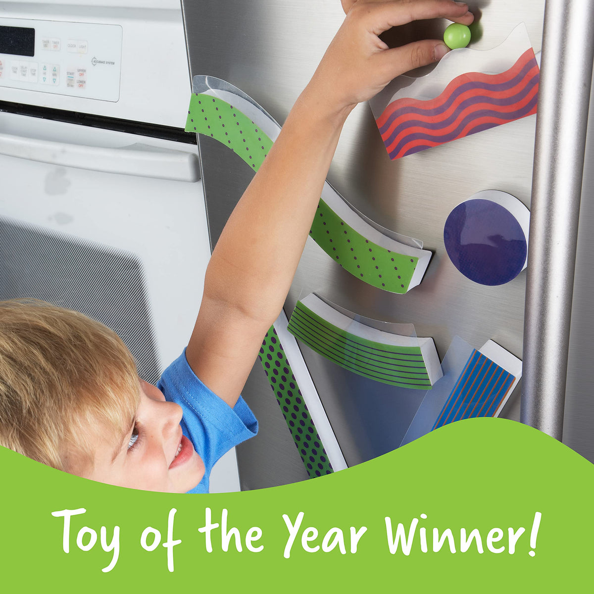 Learning Resources Tumble Trax setup on a fridge shows versatile play surfaces.