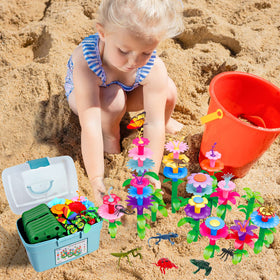 Leetous fine motor play with garden pieces builds hand-eye coordination.