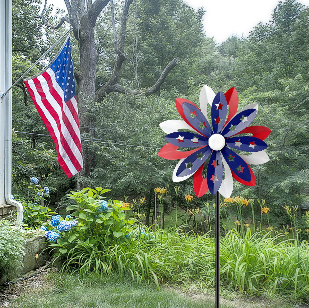 LEGIFO windmill spinner with folding vanes spins smoothly in a breeze for dynamic yard motion