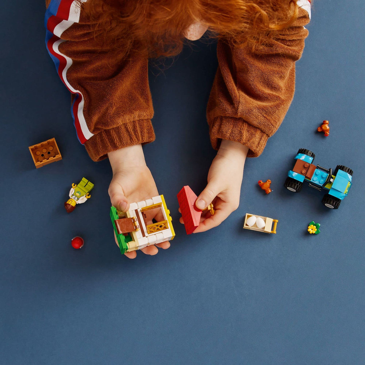 LEGO City henhouse opening doors for easy access to play scenes.