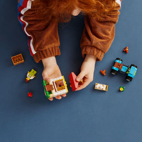 LEGO City henhouse opening doors for easy access to play scenes.