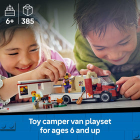 LEGO City Holiday Adventure Camper Van campfire scene with adults and baby for family play.