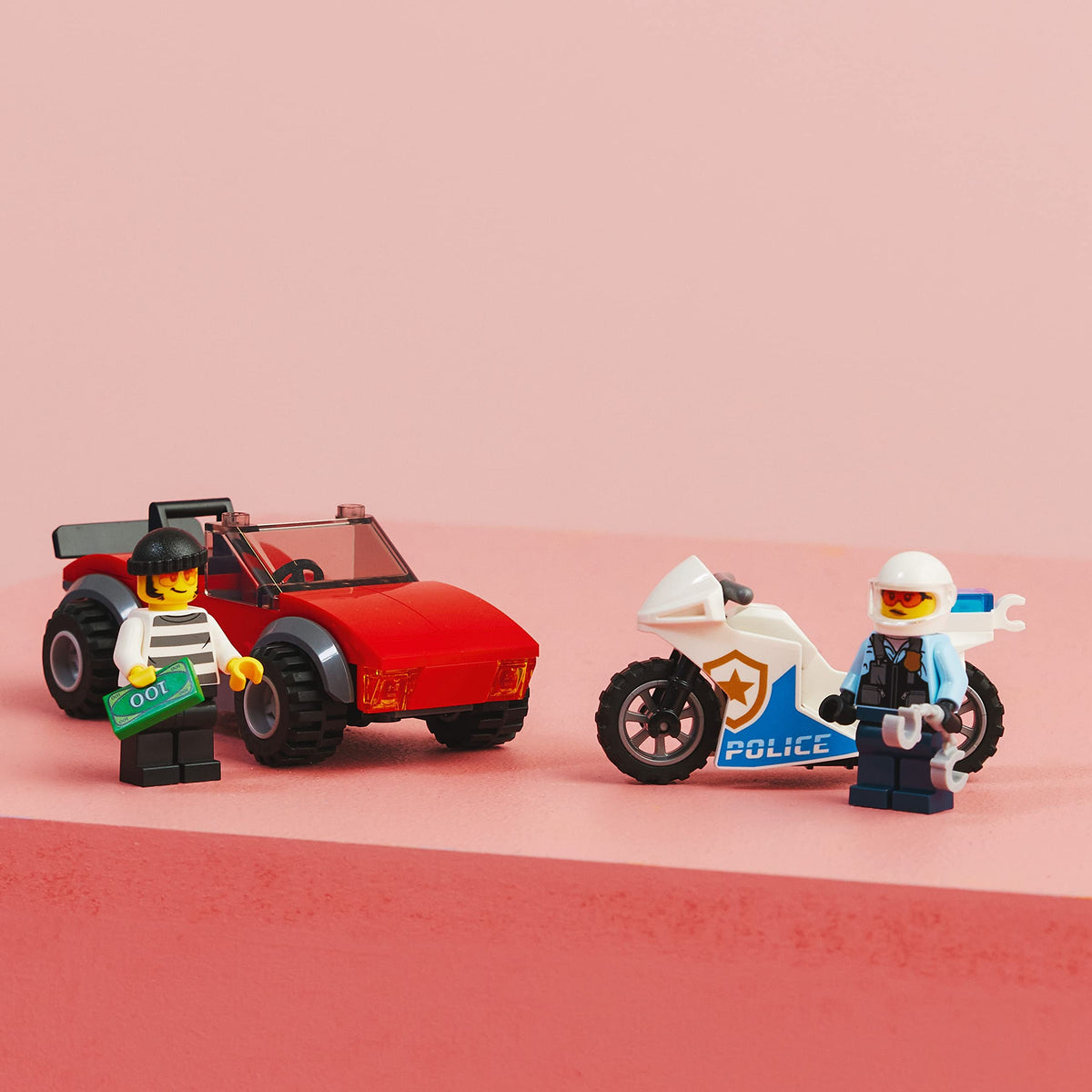 LEGO City Police Bike Chase builder app screenshot demonstrates interactive build