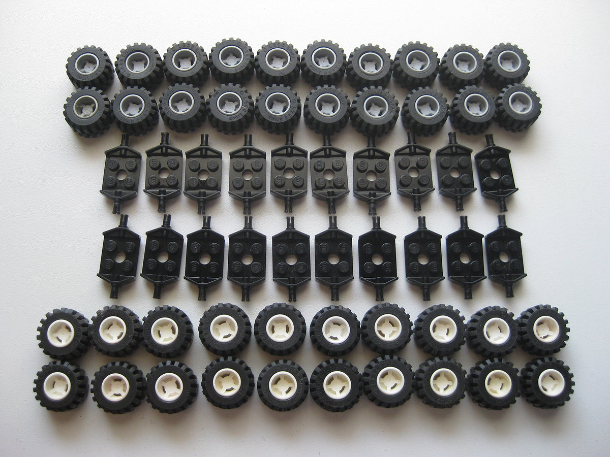 LEGO City wheel tire and axle set in black white and gray for versatile vehicle builds