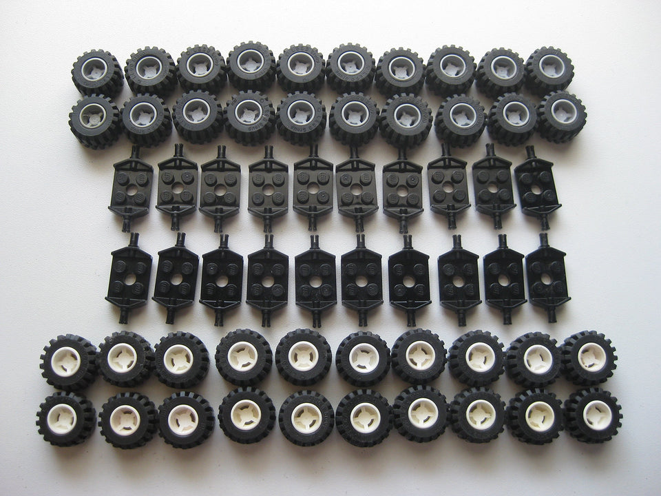 LEGO City wheel tire and axle set in black white and gray for versatile vehicle builds