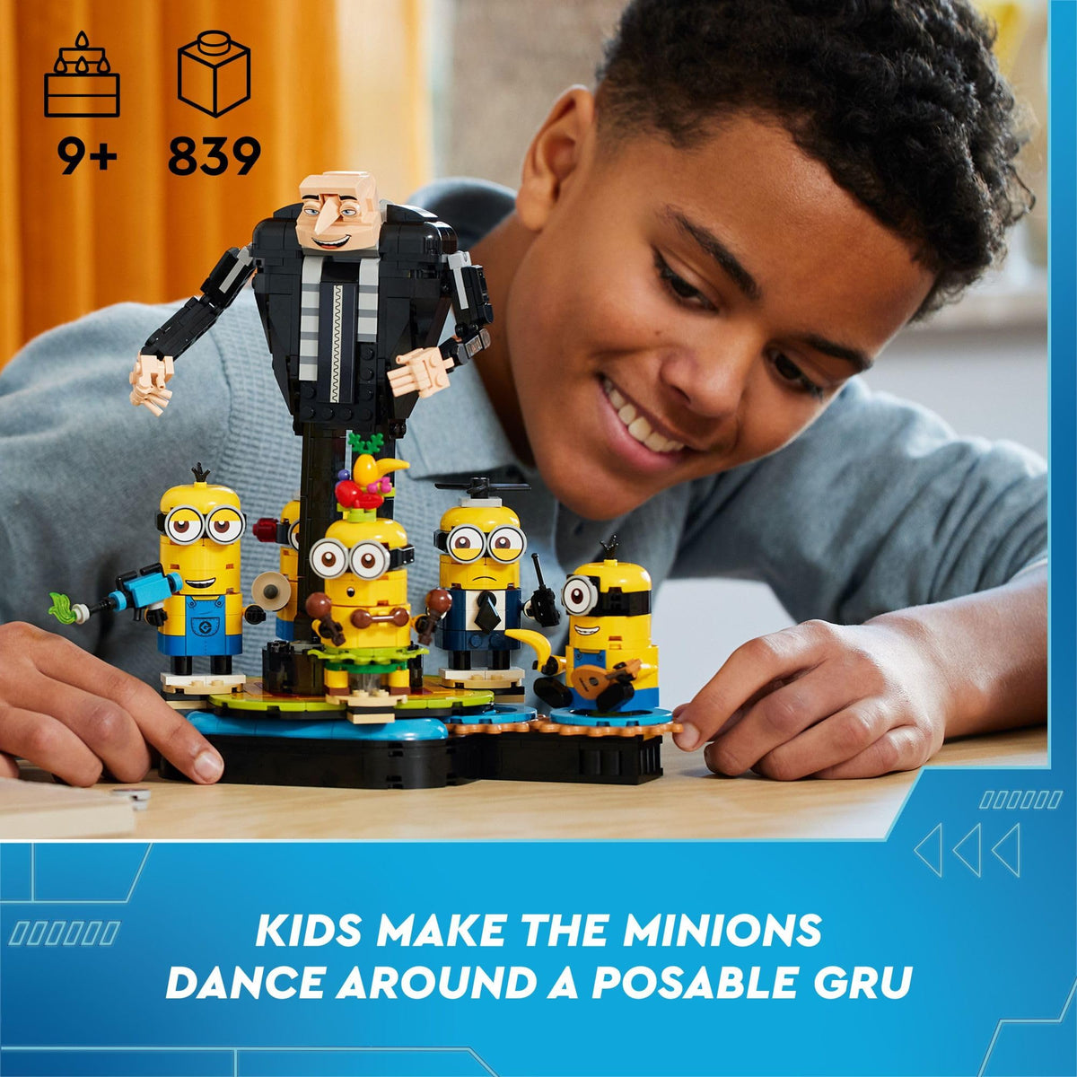 LEGO Gru with jointed limbs beside Minions on a rotating platform for display.