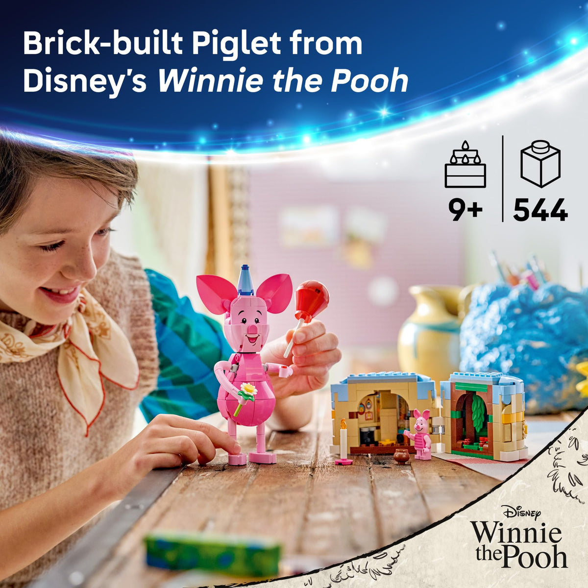 LEGO Disney Piglet's Birthday Fun cake with a candle opens to reveal rooms for storytelling.