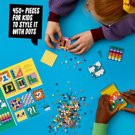 LEGO DOTS notebooks and phone cases decorated with unique mosaic patches.