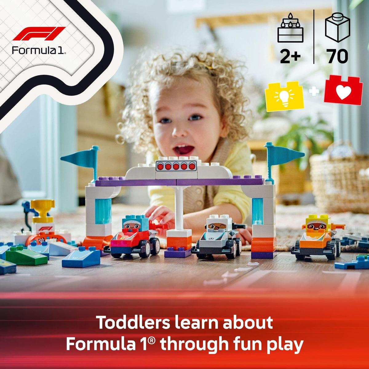 LEGO DUPLO F1 crane lift used to lift cars for pitstop practice.